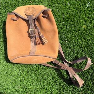 Vintage Dooney and Bourke tan unbuck Leather Drawstring Backpack